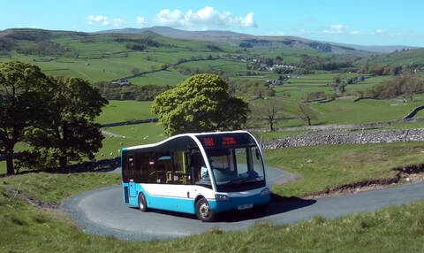 Malham Tarn Shuttle bus 881 leaving Langcliffe